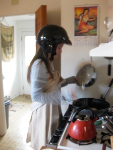 makes pancakes in a scooter helmet